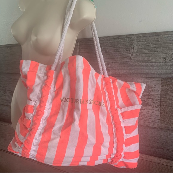 Victoria's Secret Handbags - Victoria’s Secret striped bag with rope handles and magnetic snap, side pockets.